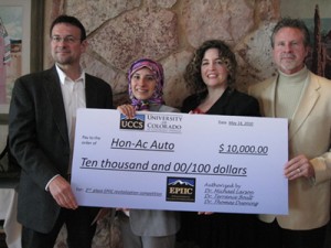 Hon-Ac Auto L-R Randy Schillinger, owner, student Zahra Befhar, student Jennifer Nail, and Dan Kane, owner
